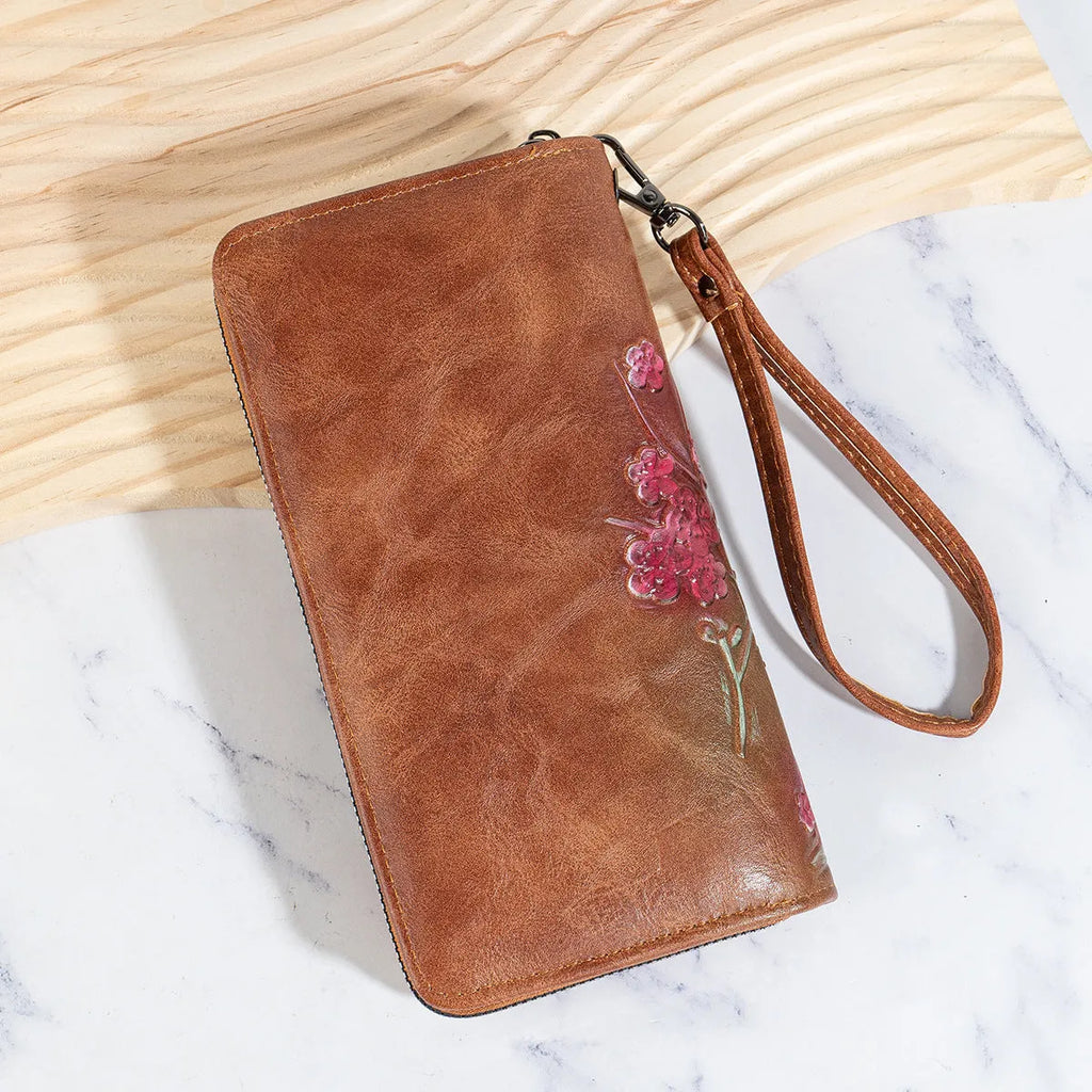Chinese style handbag with embossed floral pattern in retro design with zipper closure