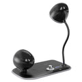 Three-in-one desk lamp with wireless charging pad, digital clock display, and LED lighting in black or white