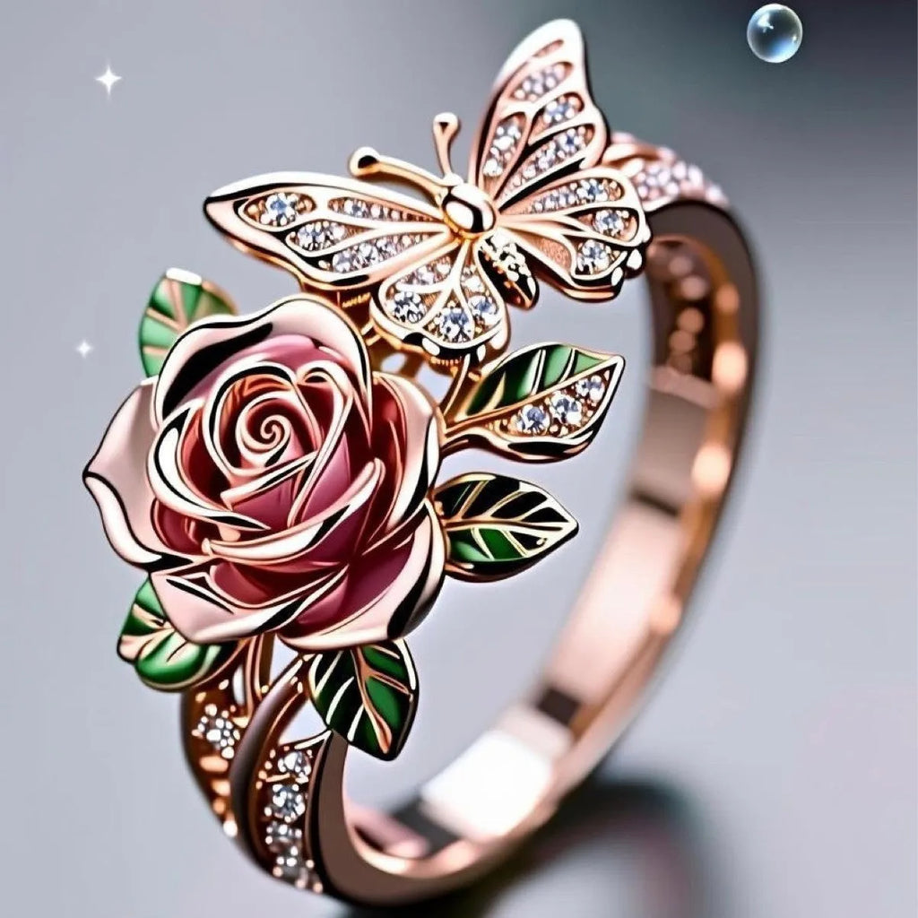 Adjustable butterfly personality ring with colourful oil treatment showing flower, insect and leaf elements