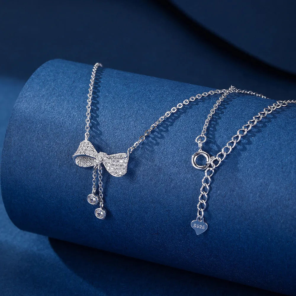 Women's S925 sterling silver bow pendant necklace on O-ring chain