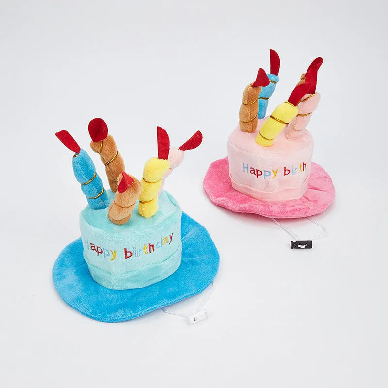 Blue or pink dog birthday hat toy for small to medium dogs on a white background.