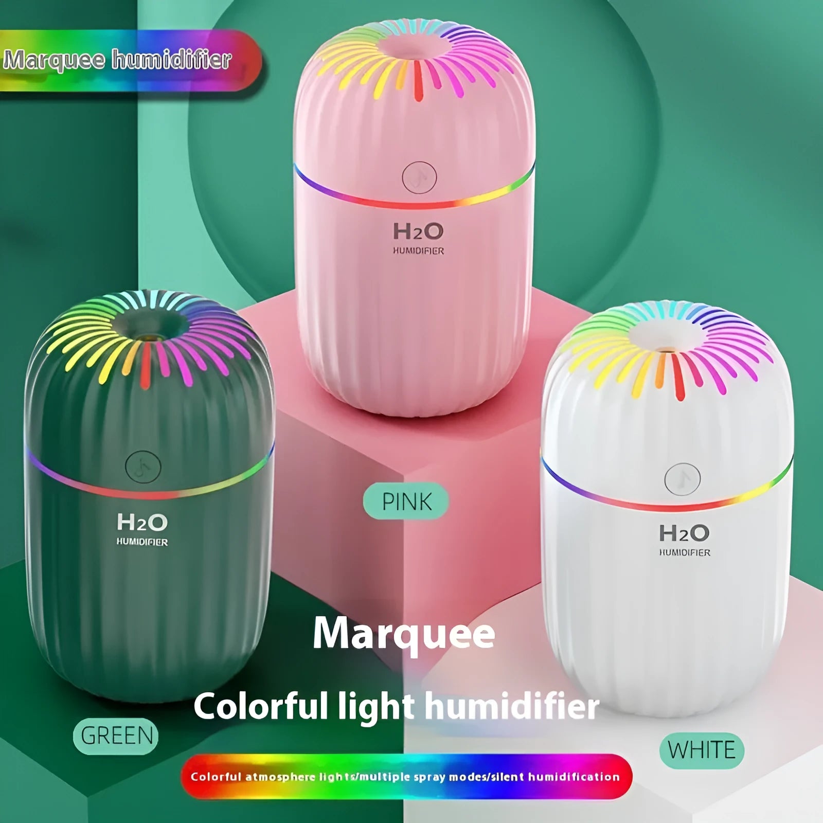 Mini car-shaped USB aromatherapy humidifier in green, pink, or white colours on a desk.
