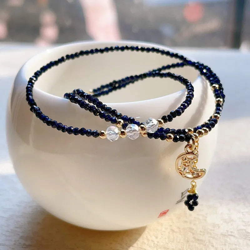 Blue gold sand stone cut women's bracelet with three interlocking rings in multi-layer design