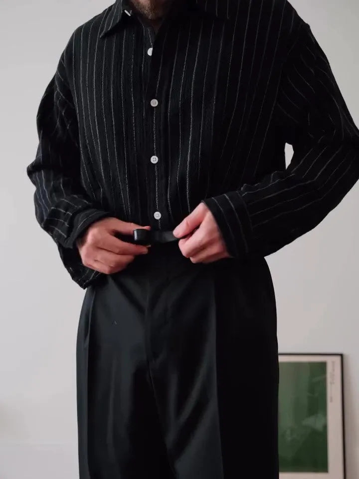 Black pinstriped button-down business shirt with regular fit and polyester construction