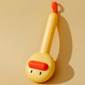 Small yellow duck comb for pet grooming with needle brush construction