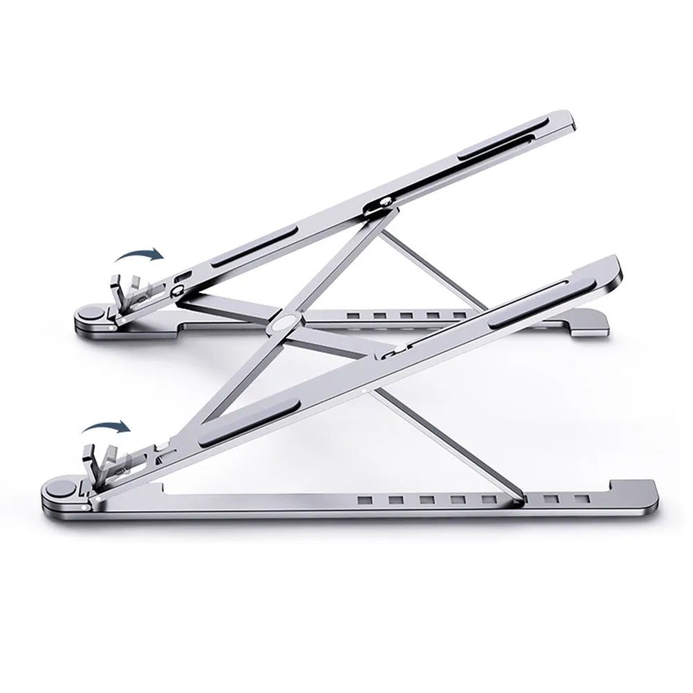 Portable aluminium laptop stand folded flat next to an open laptop showing its adjustable height.
