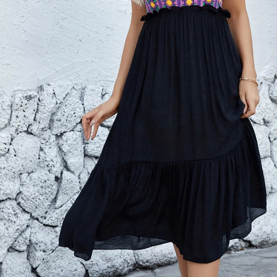Purple women's sleeveless dress with detailed floral embroidery stitching on the front.