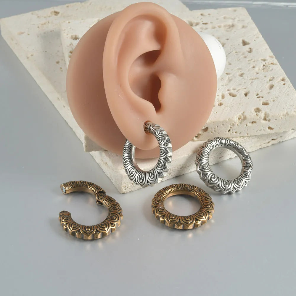 Pair of large stainless steel geometric dragon earrings with antique silver finish and alloy fittings.