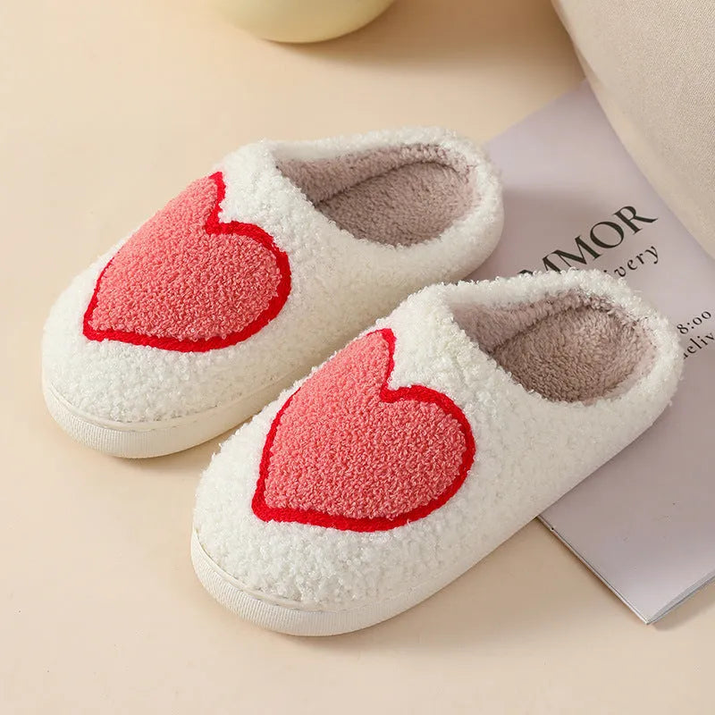 Women's plush home slippers with cartoon love print and non-slip PVC sole