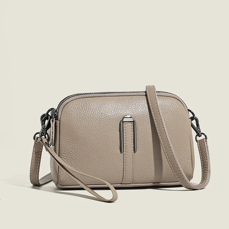 Women's genuine leather shoulder bag in square design with 19x13x6cm dimensions