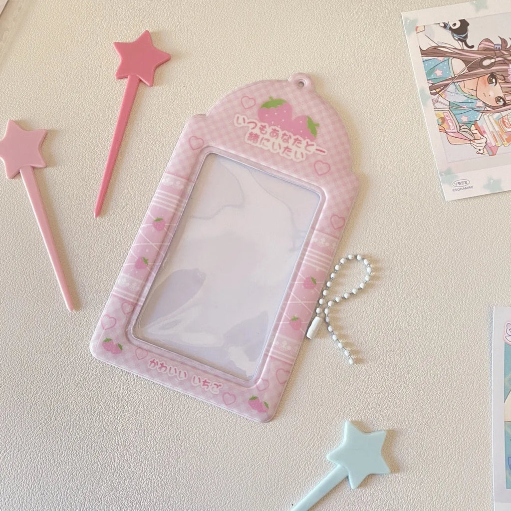 Cartoon plaid PVC card holder pendant in strawberry and four-leaf clover styles for 3-inch cards.