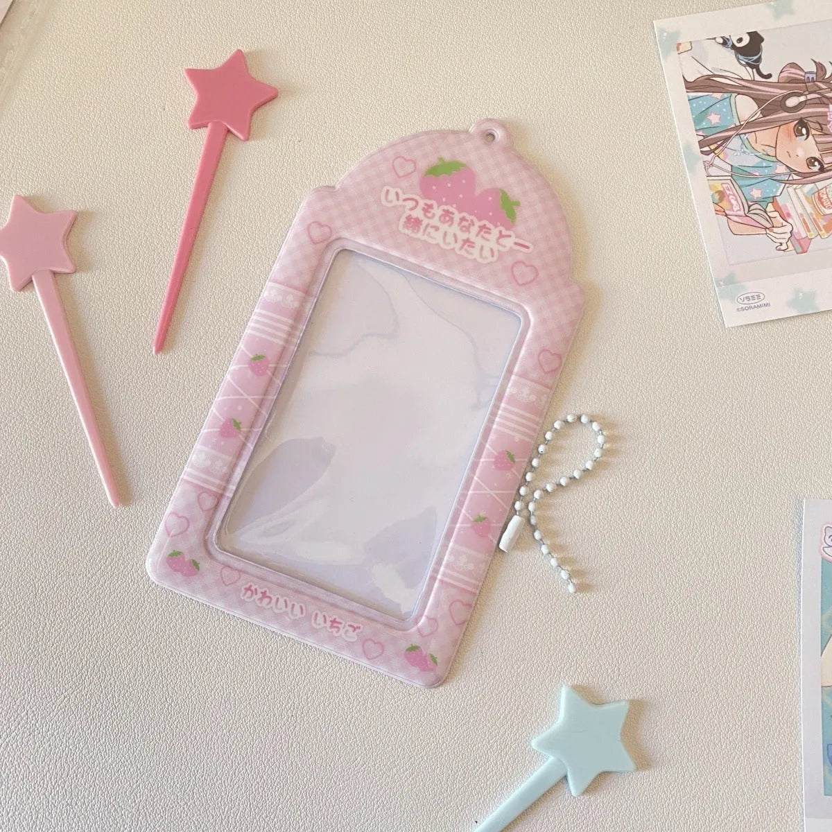 Cartoon plaid PVC card holder pendant in strawberry and four-leaf clover styles for 3-inch cards.