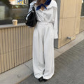 Women's white striped wide-leg loose fit trousers with front zip for commuting office wear