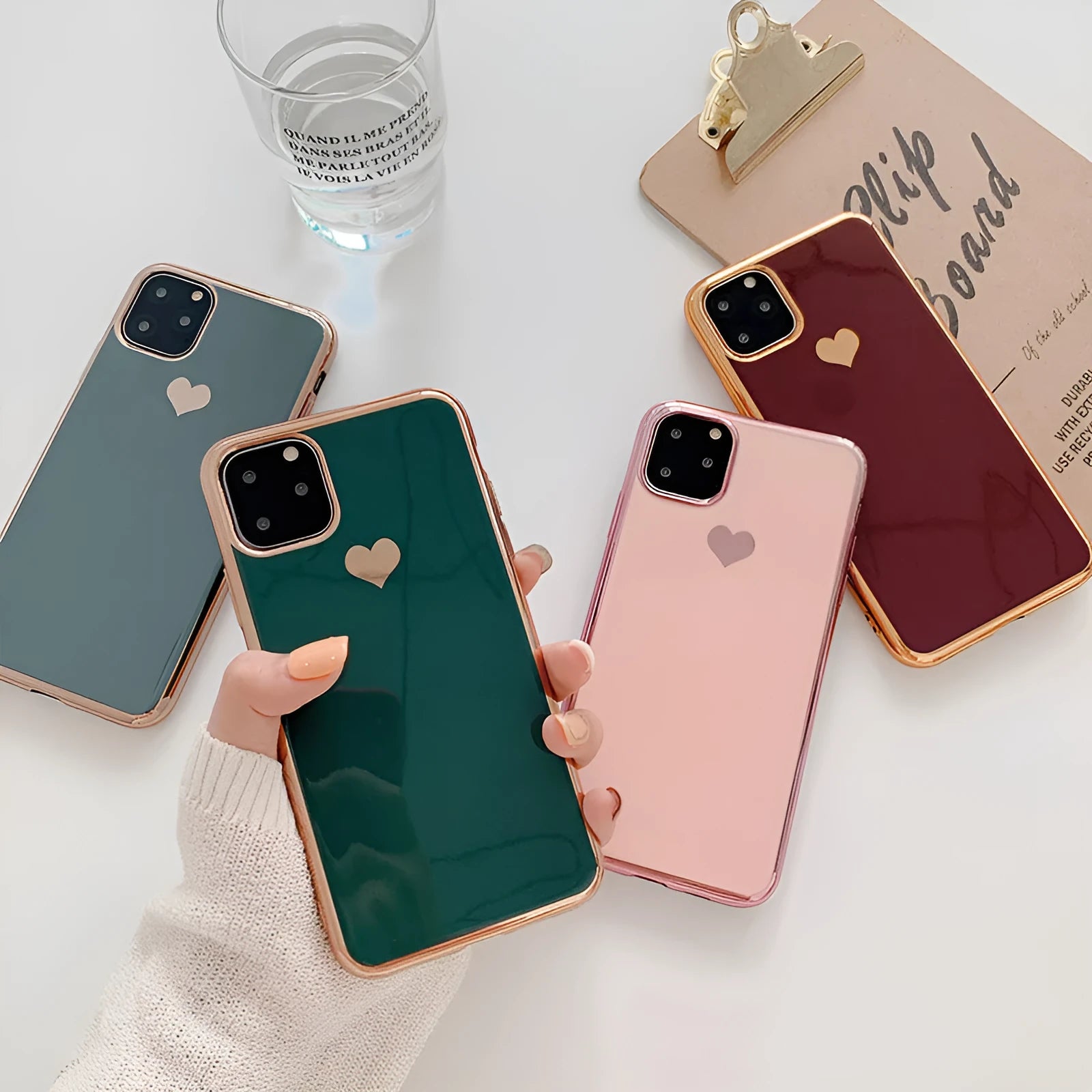 Blue TPU luxury plating love back cover case on an iPhone.