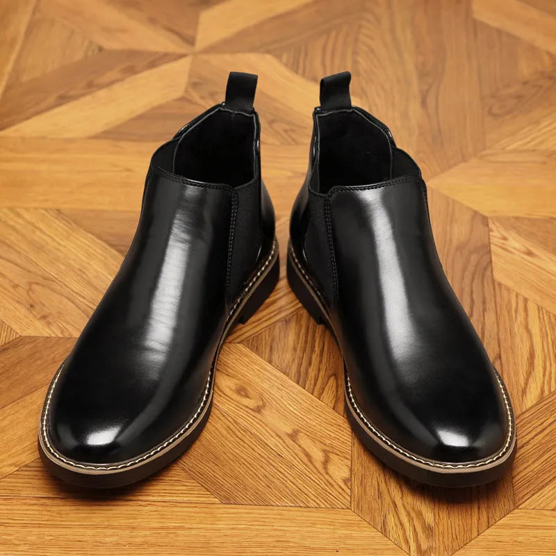 Men's black formal pointed-toe leather boots with a square heel and rubber sole.