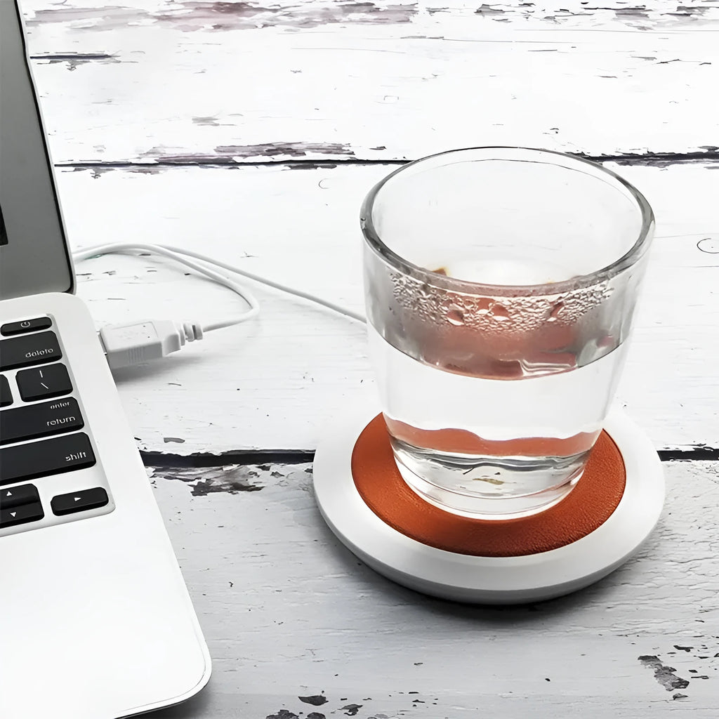 Black USB-powered heating coaster with high temperature heater for desk use.