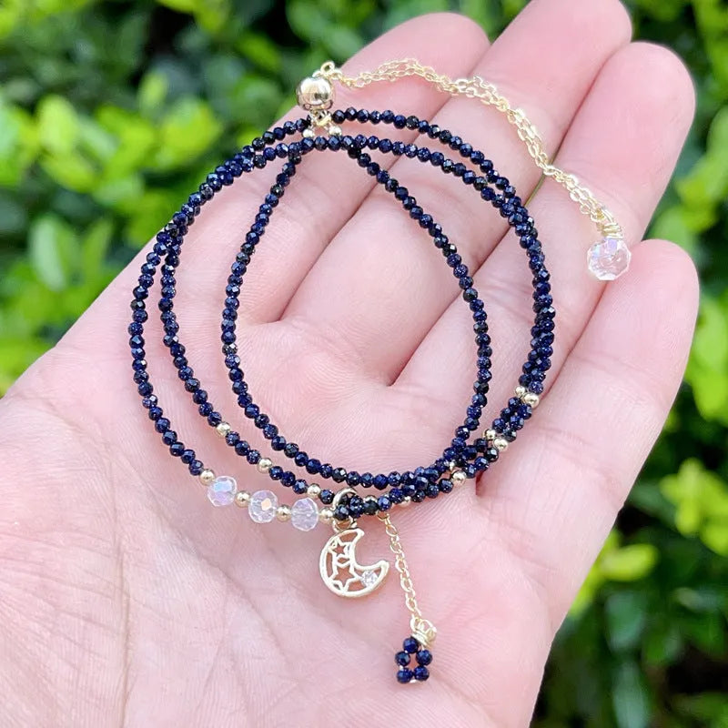 Blue gold sand stone cut women's bracelet with three interlocking rings in multi-layer design