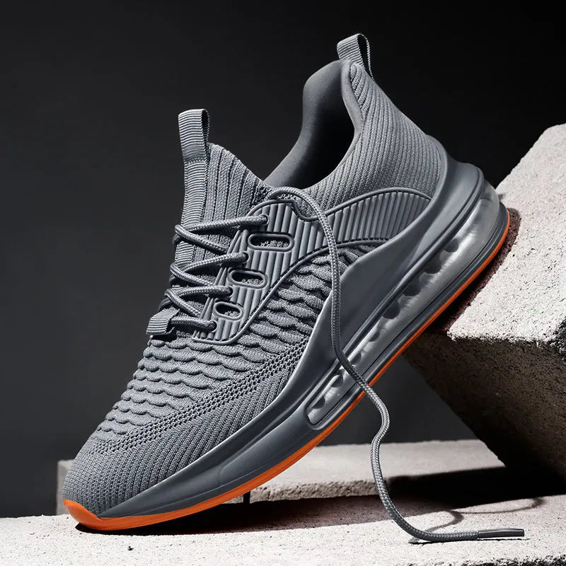 Men's low-top mesh running shoes in black with rubber sole and lace-up front