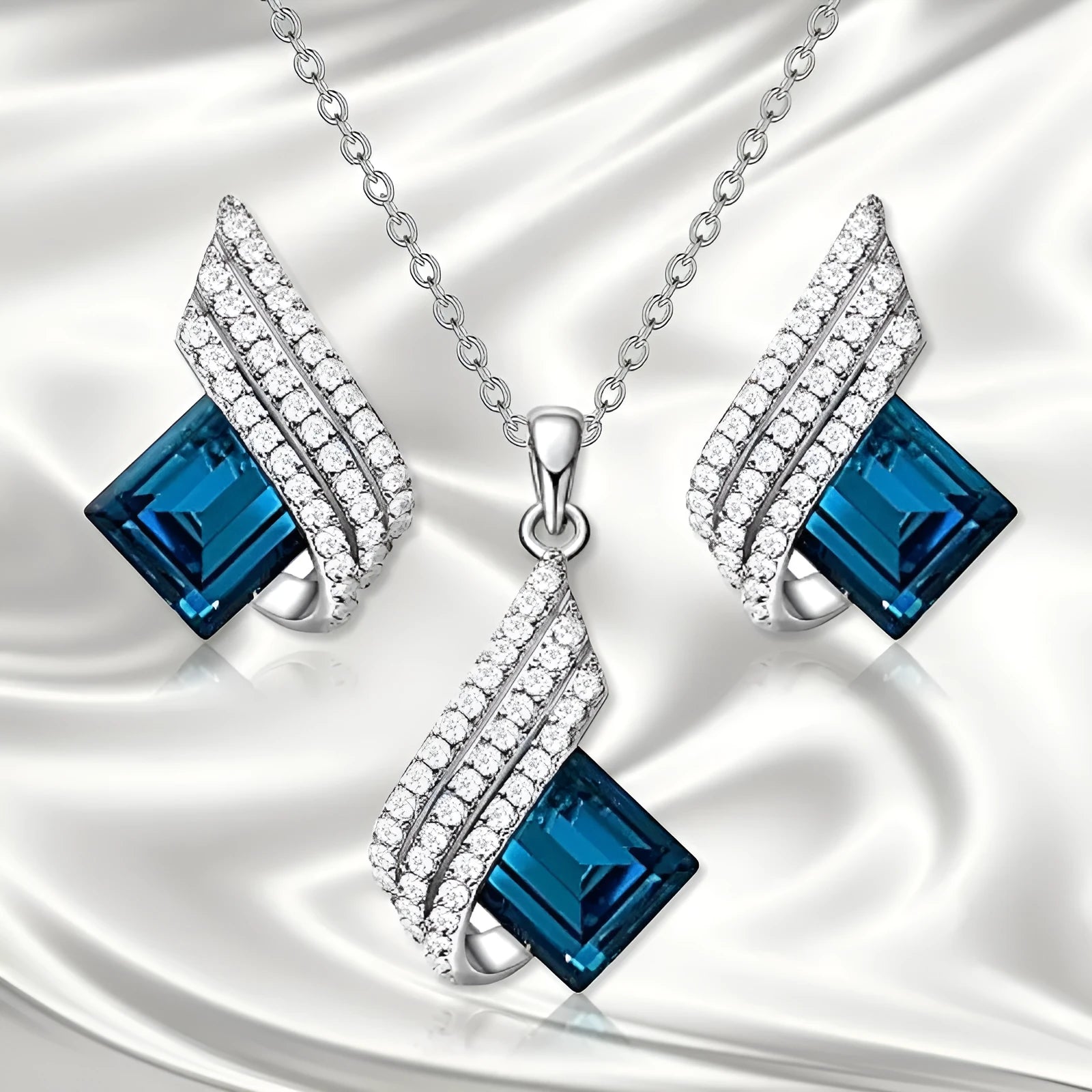 Glass pendant and alloy cross chain necklace with matching electroplated ear studs jewellery set in two style colours.