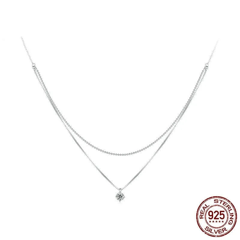 Women's double-layer sterling silver necklace with pearl chain detail in polished silver colour