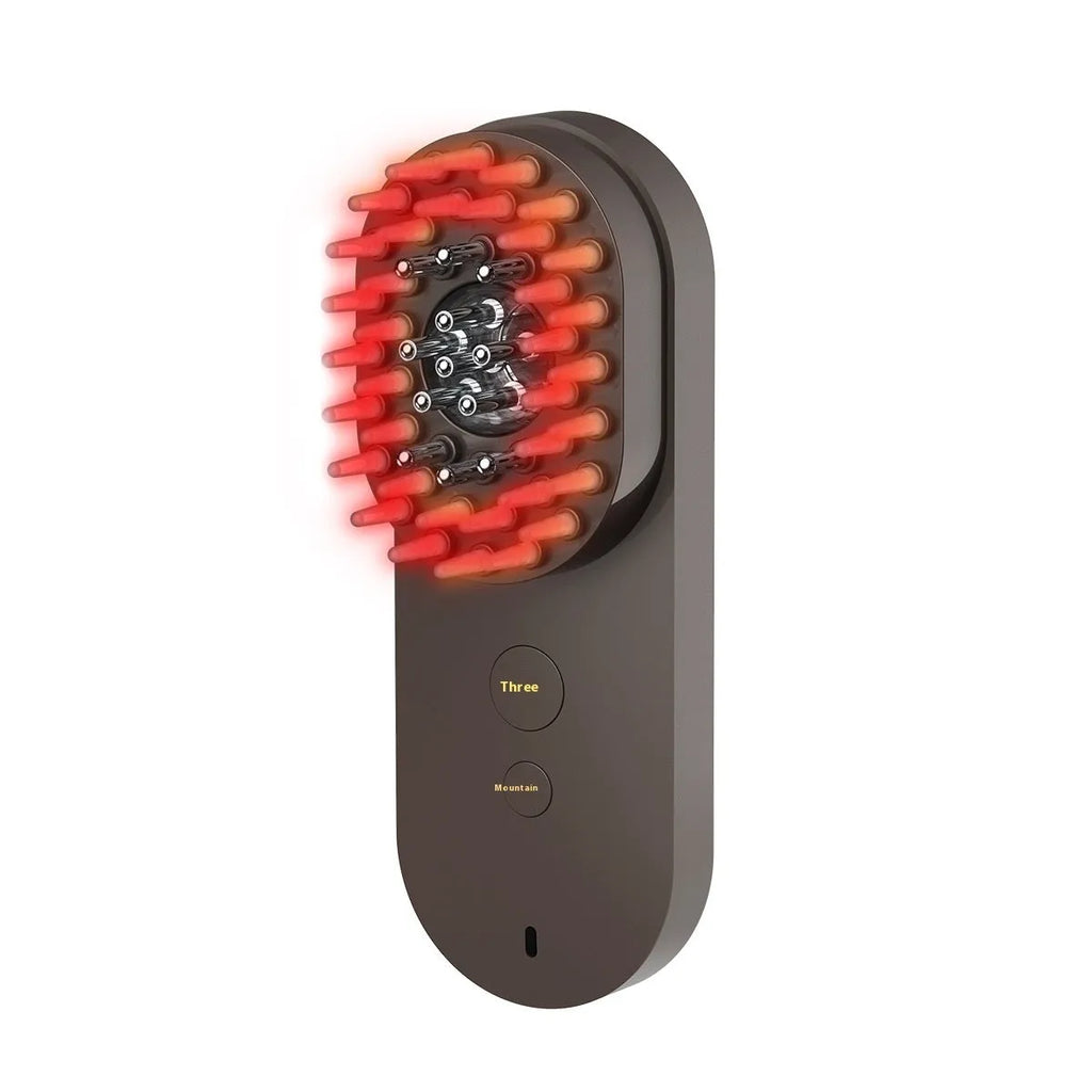 Pink and black smart massage comb for scalp care with red light therapy, shown next to a ruler indicating size under 10cm.