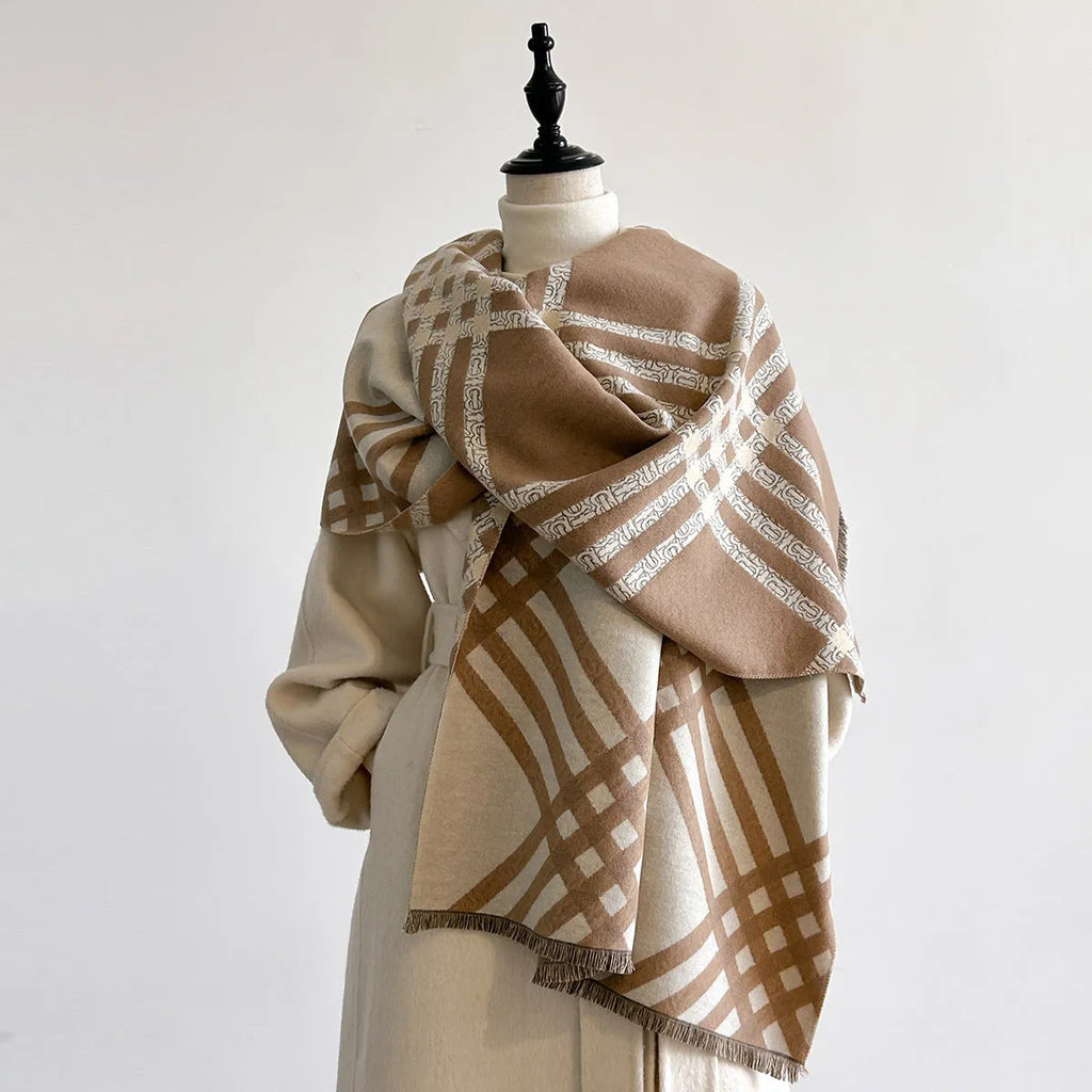 Long brown imitation cashmere scarf with tassel ends laid flat showing its full 185cm length.