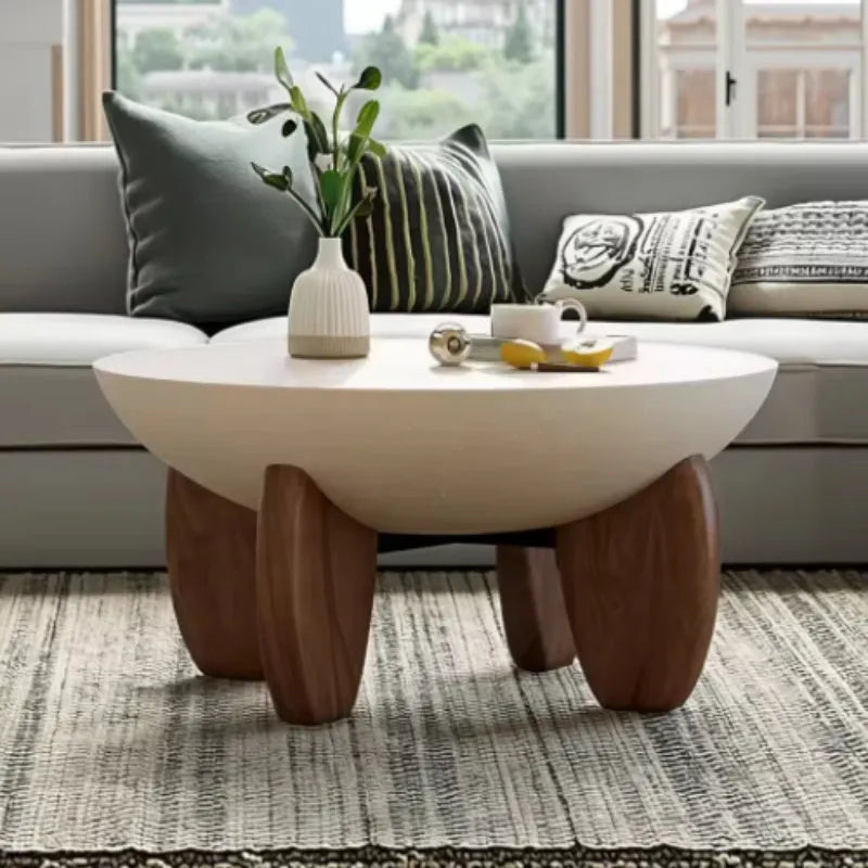 White solid wood coffee table with adjustable height legs and built-in storage compartment