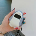 Coloured silicone protective cover with shark design for Apple AirPods 1 and 2 charging case.