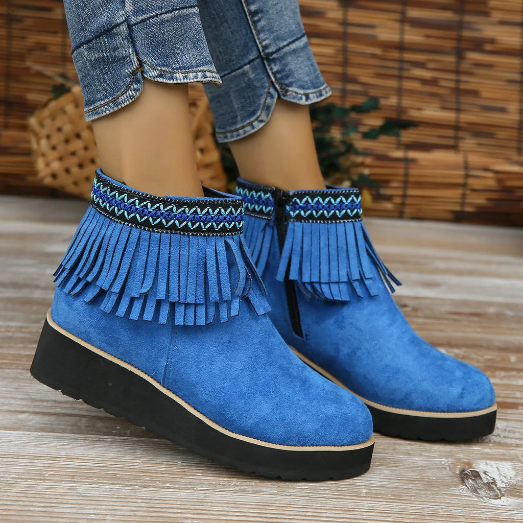 Women's dark brown suede wedge ankle boots with side zip and decorative tassel.
