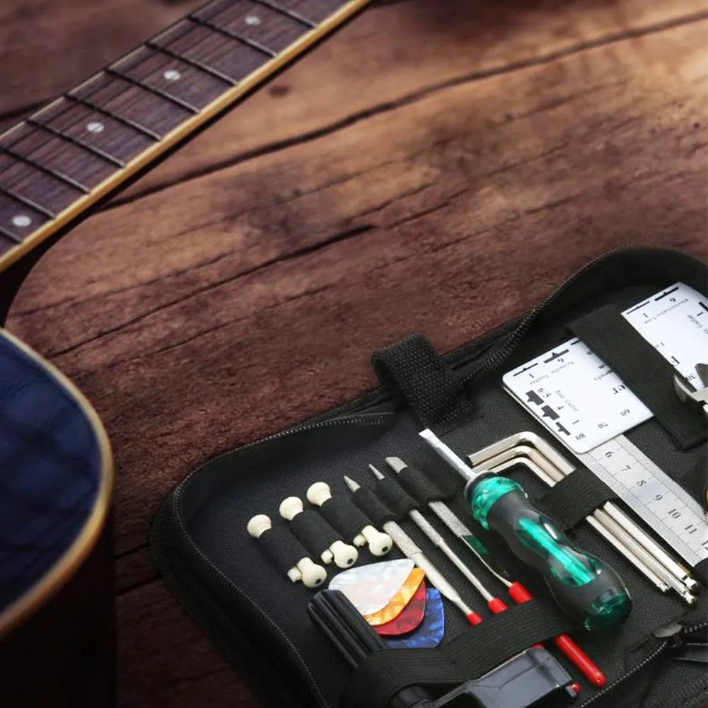 Black plastic guitar repair tool kit case for instrument maintenance