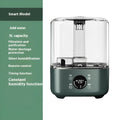Green intelligent humidifier with touch screen panel and remote control on a table