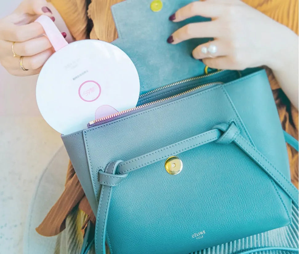Blue USB-powered baby bottle steriliser showing slim 11.8mm profile with gravity-sensing technology