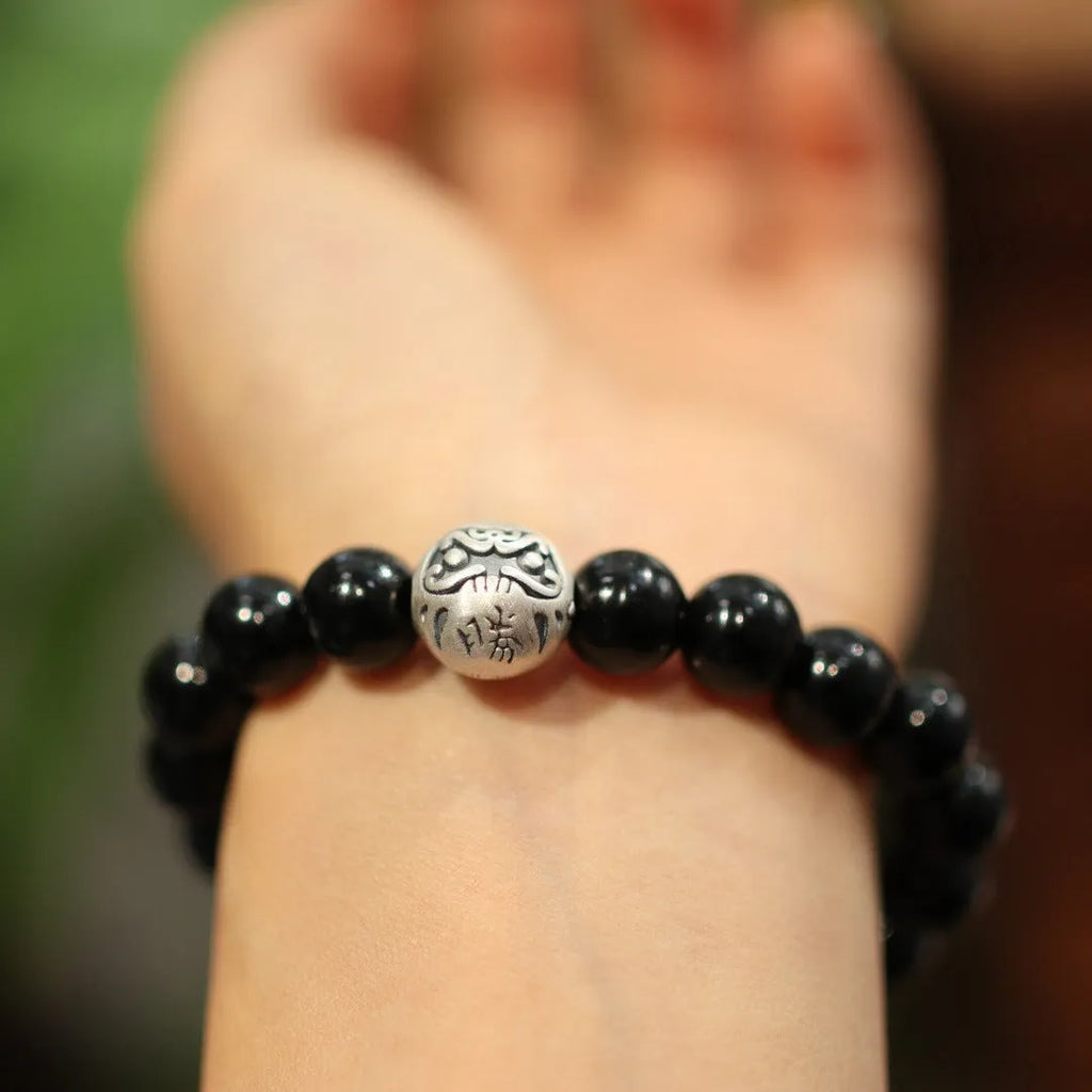 Black agate bracelet with 10mm beads, sterling silver components, and Chinese style design