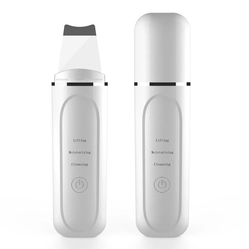 Pore cleansing facial device in golden finish with metal head, resting on a surface with USB cable