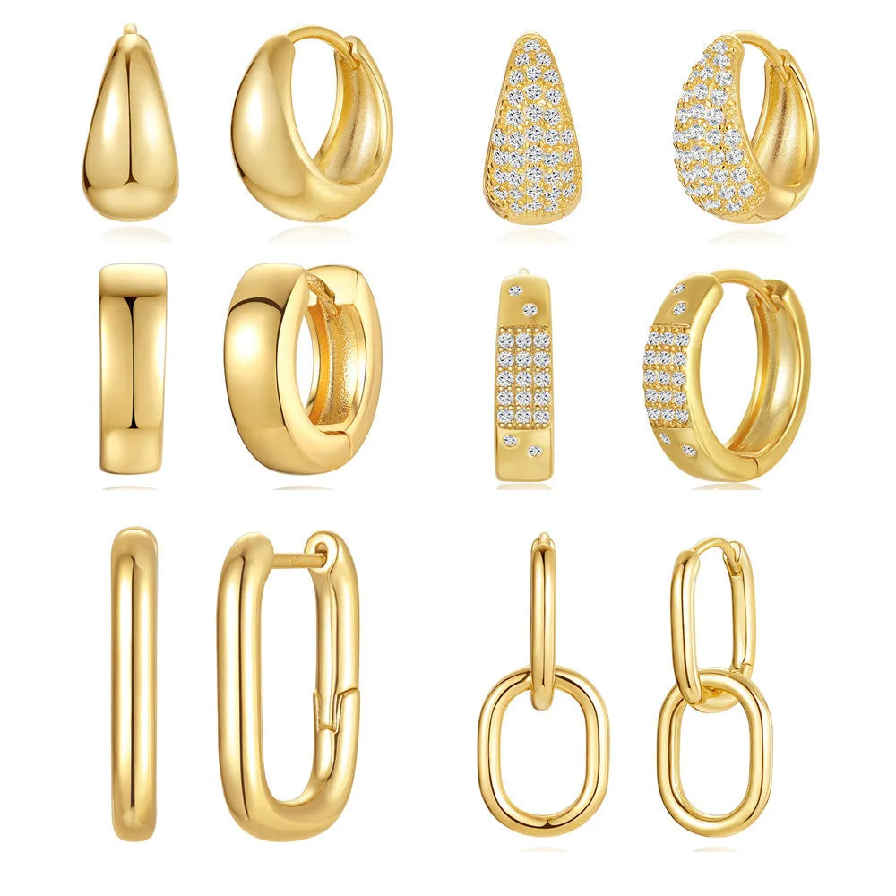 Brass geometric earclip earrings with gold electroplated finish and round design elements