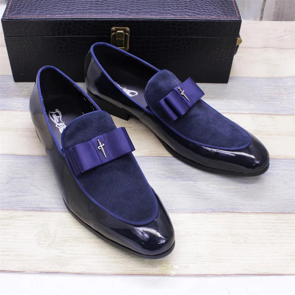 Men's glossy patent leather low-top shoes with a tassel in black, shown from a side view.