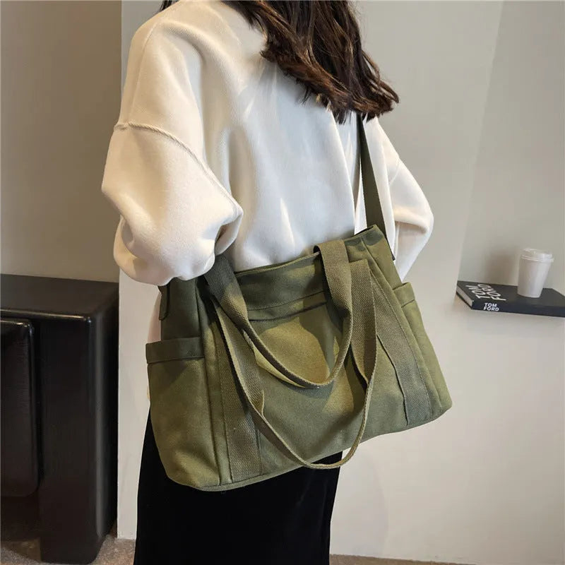 Large capacity polyester shoulder tote bag for women in solid colours with mobile phone pocket