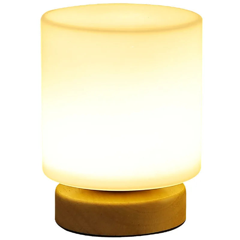 Nordic style solid wood USB table lamp in white, showing touch dimming and one of the geometric shape options.