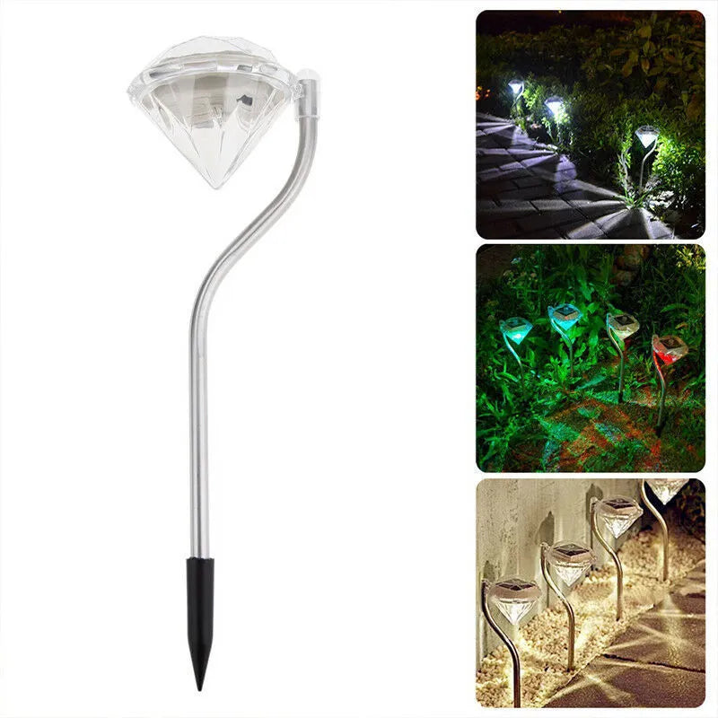 Solar powered garden diamond light with adjustable angle and solar panel on adjustable mount.