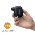 Black AS100 mini electric bike pump with USB charging cable and waterproof bag.