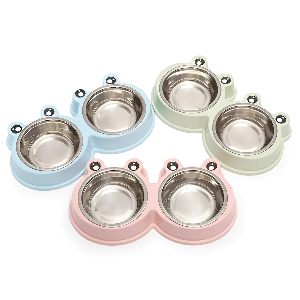 Blue stainless steel frog-shaped double pet bowl for food and water on a floor.