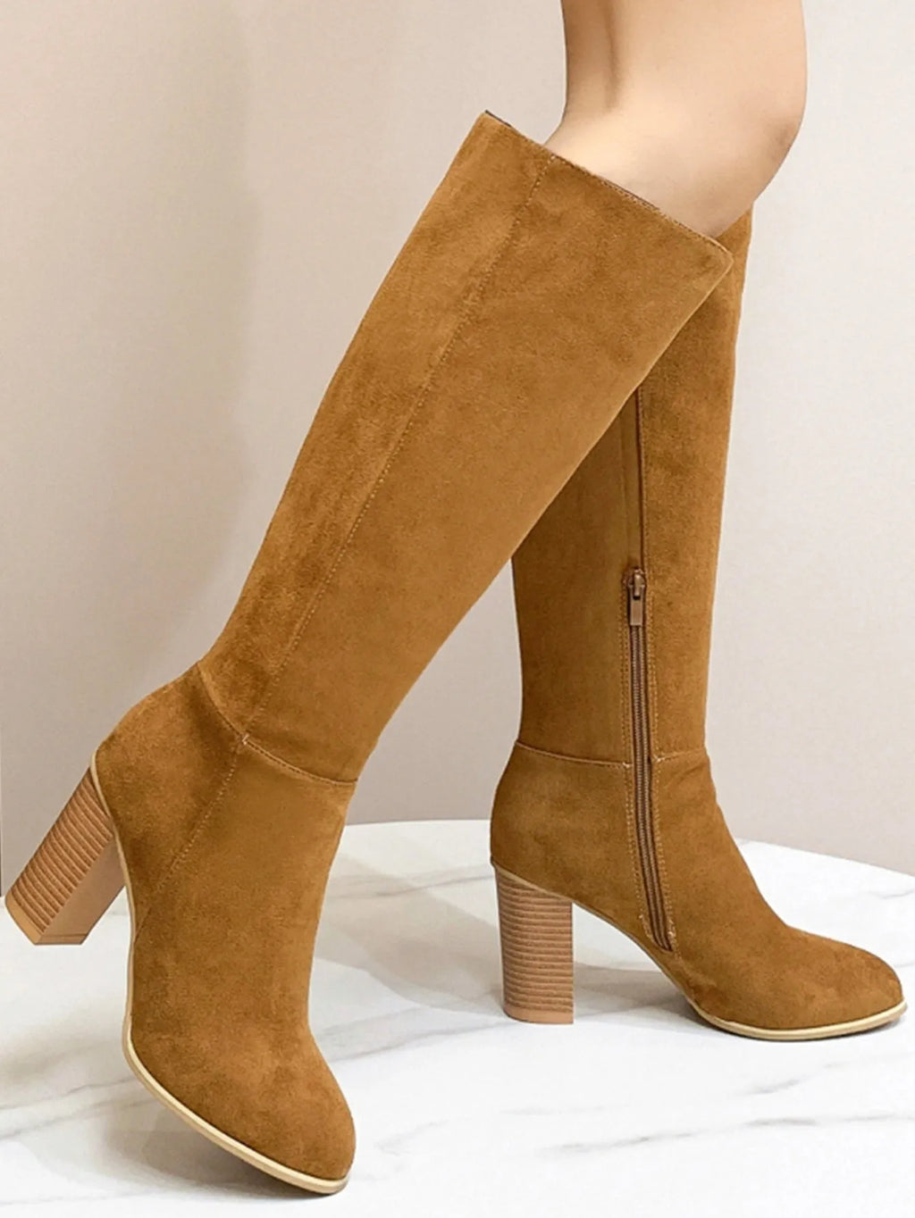 Women's black square toe high heel boots with artificial PU upper on wooden floor