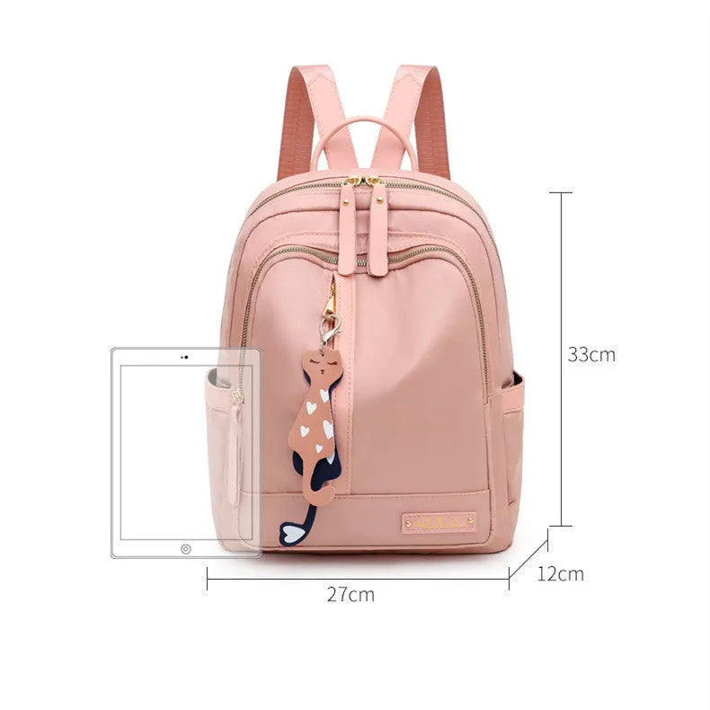 Women's soft nylon casual backpack in black colour with double shoulder straps and external pockets