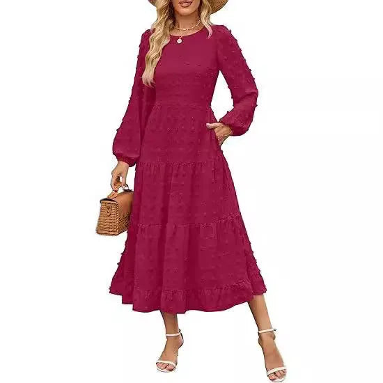 Women's beige high-waist long sleeve dress with ruffled sleeves on a hanger.