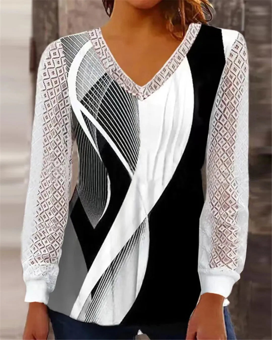 Women's loose V-neck lace blouse in purple polyester chiffon fabric showing lace detailing