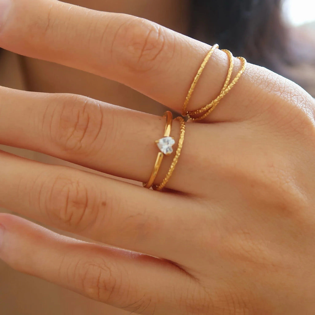 Golden electroplated stainless steel women's bracelet in heart and oval designs with size options