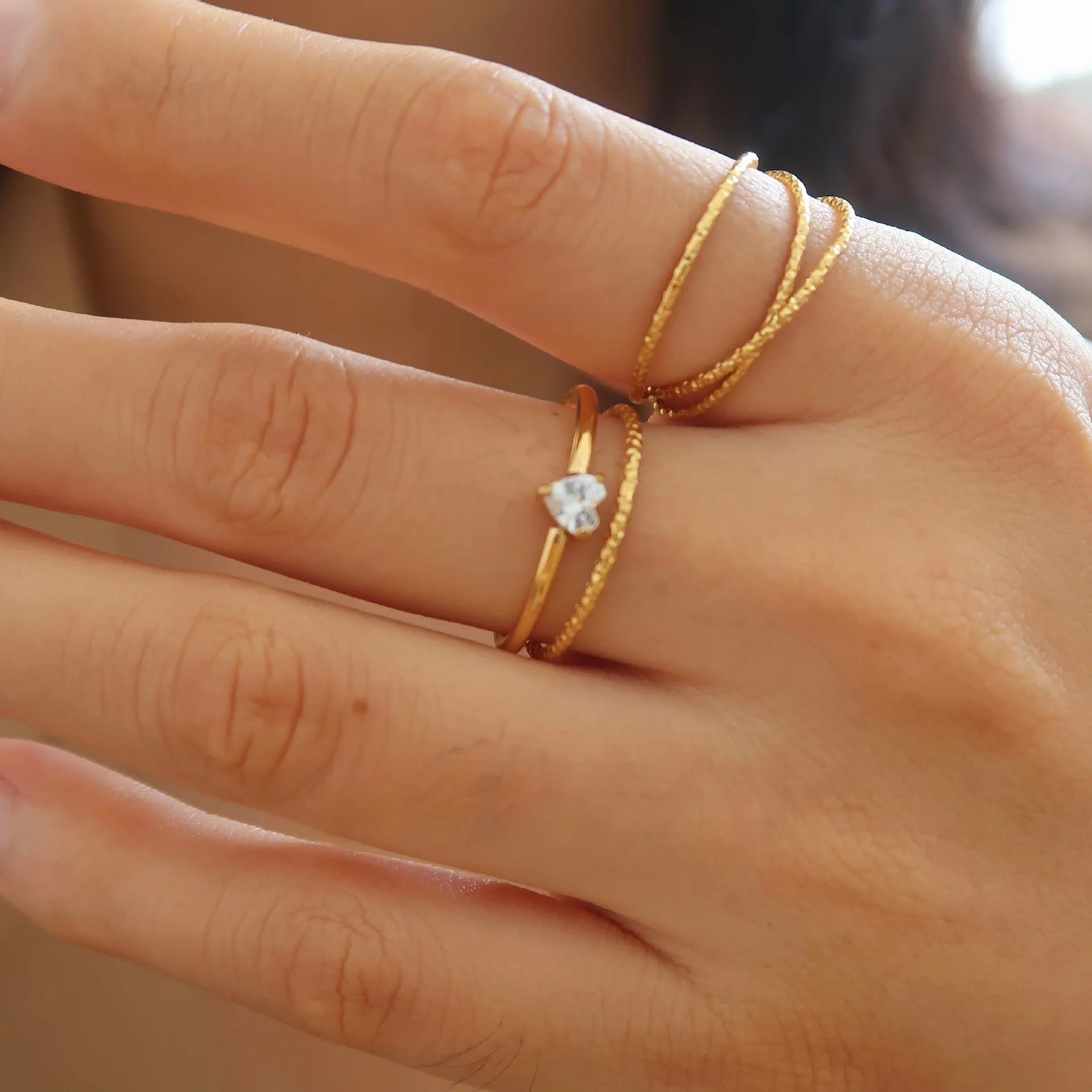 Golden electroplated stainless steel women's bracelet in heart and oval designs with size options