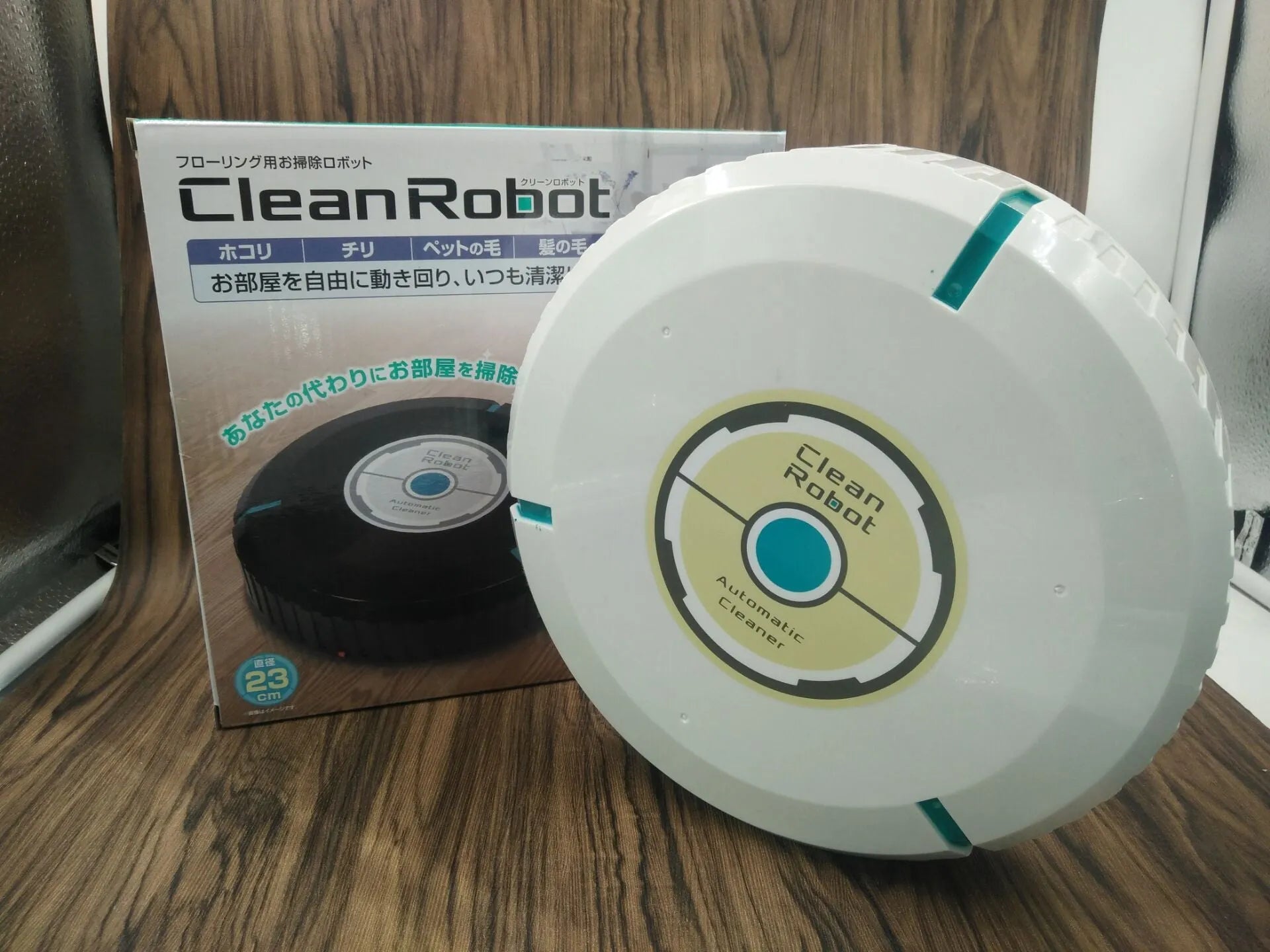Black and white ABS automatic sweeping robot cleaner 23cm for multiple floor types
