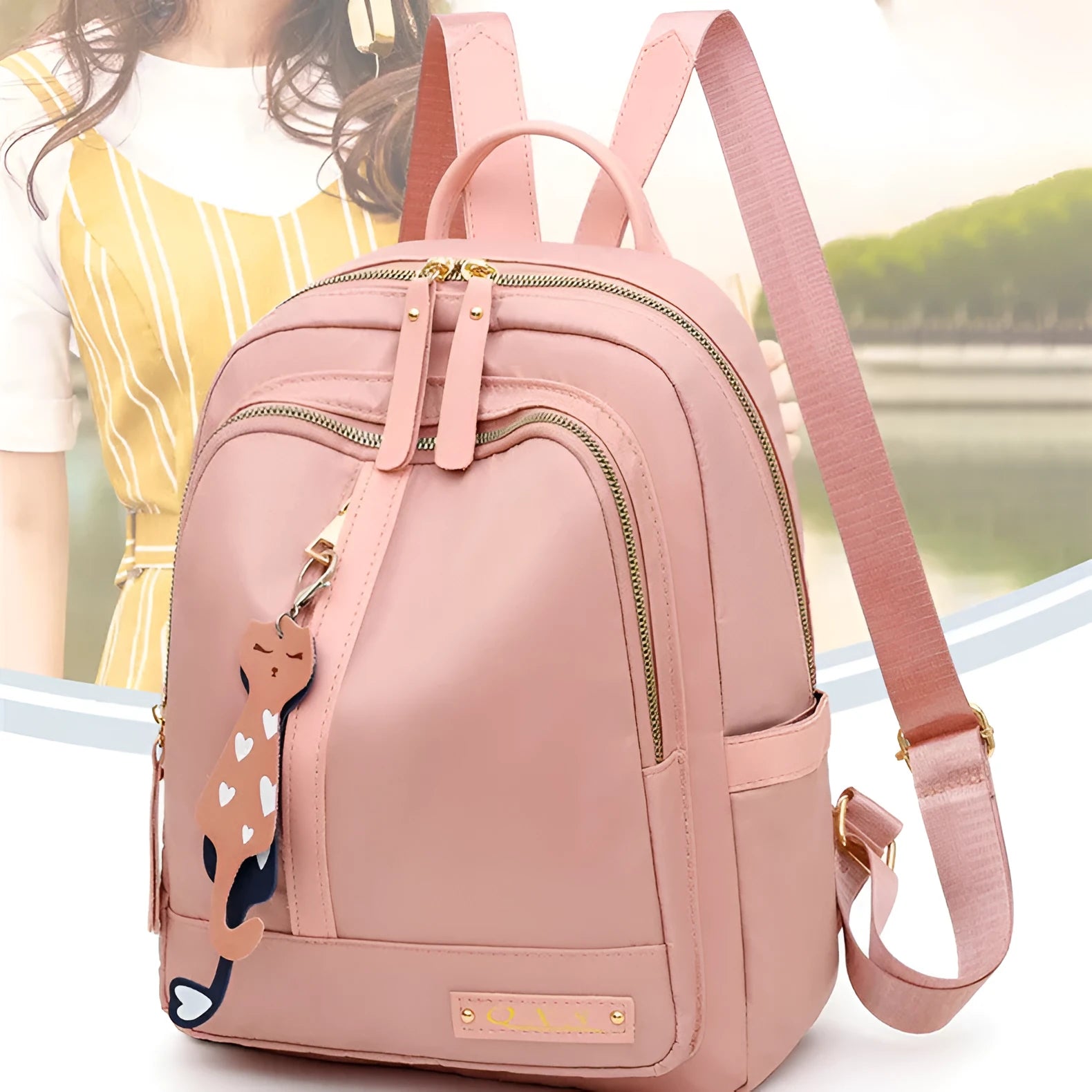 Women's soft nylon casual backpack in black colour with double shoulder straps and external pockets