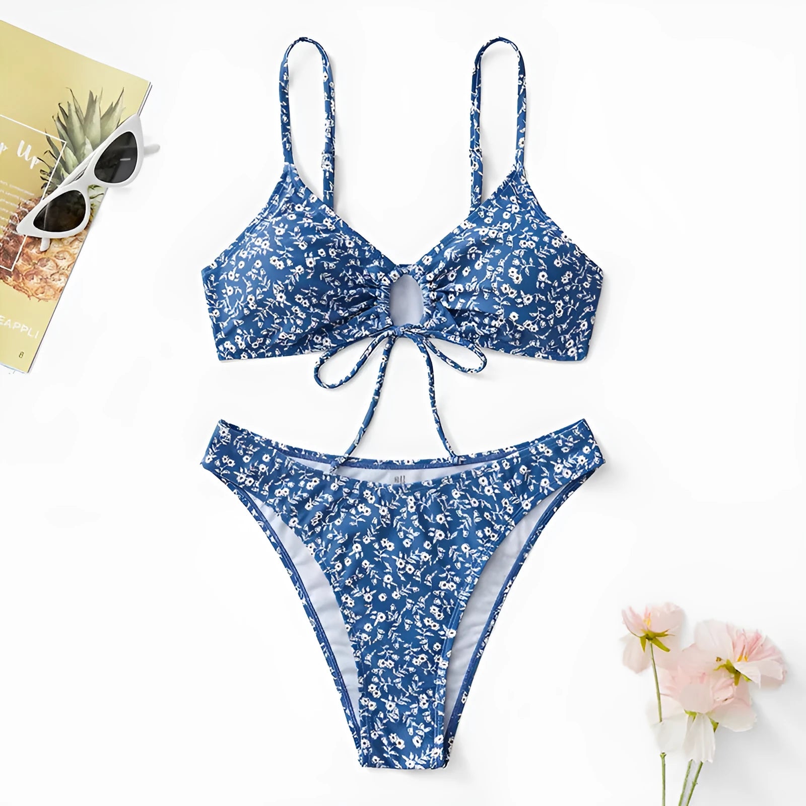 Blue polyester three-piece swimsuit set without steel rings, includes bikini top and shorts.